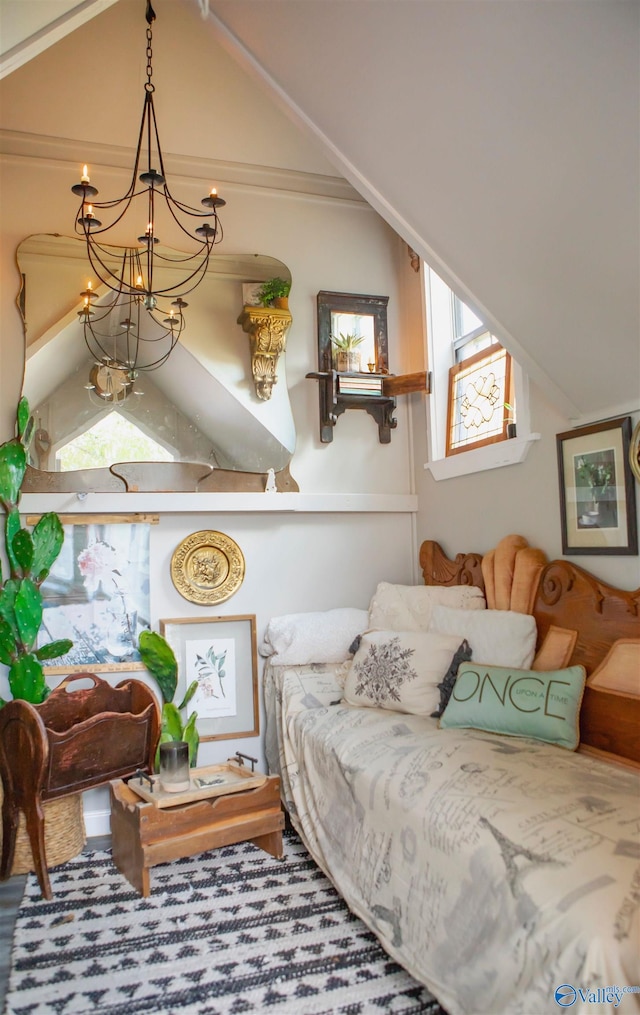 living room with ornamental molding, vaulted ceiling, and a chandelier