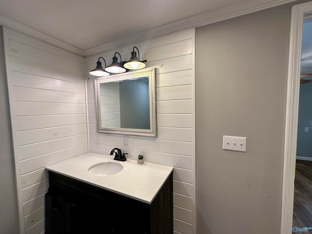 bathroom featuring vanity and wood-type flooring