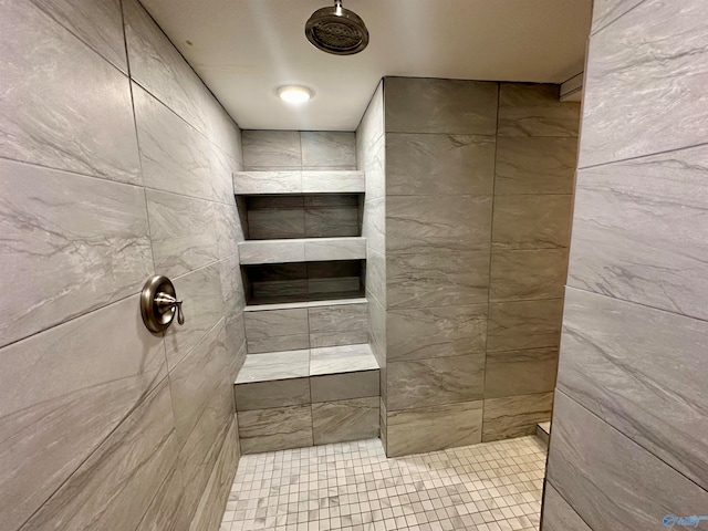 bathroom with tile patterned floors and walk in shower