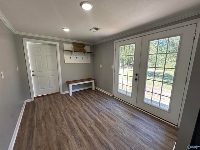 entryway featuring french doors, ornamental molding, a textured ceiling, and hardwood / wood-style floors