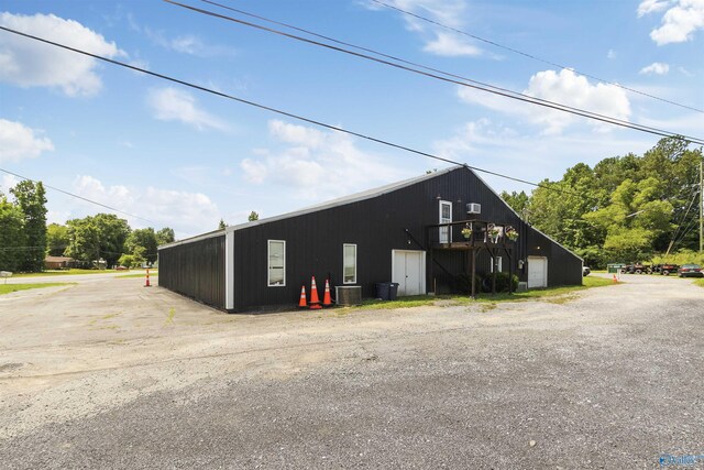 view of outbuilding with cooling unit