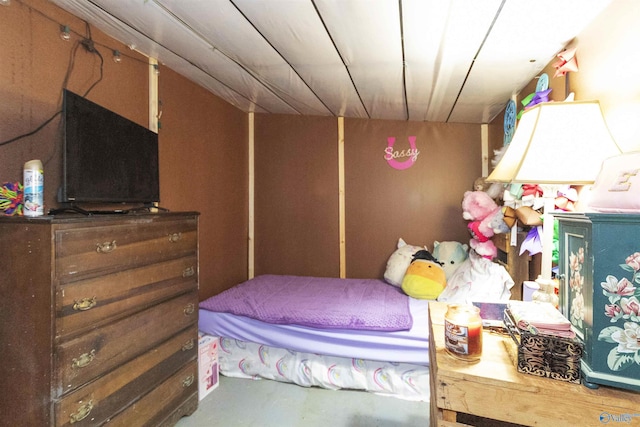 bedroom with concrete floors