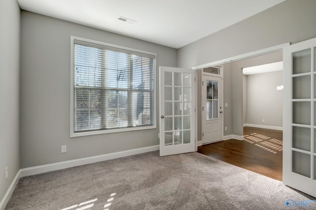 interior space featuring carpet and french doors