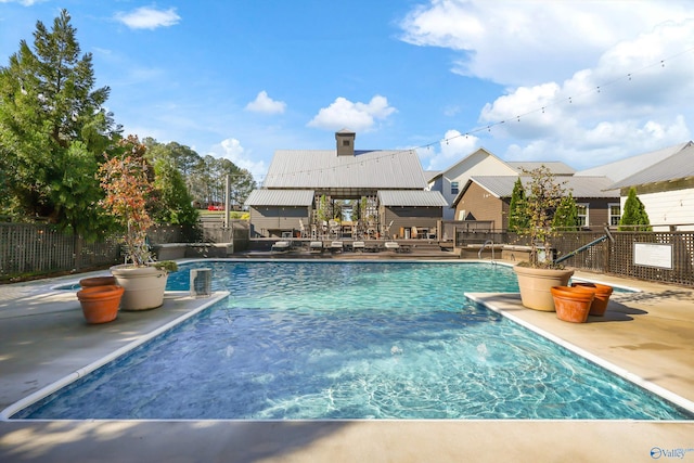 view of pool with a patio