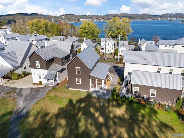 drone / aerial view with a water view