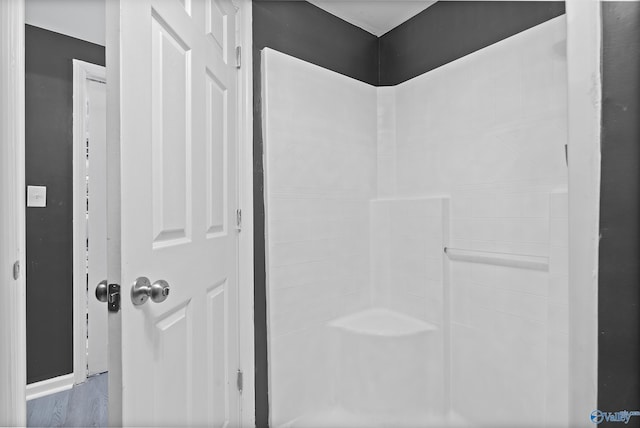 929 Carroll Rd, Harvest, AL 35759 - bathroom featuring a shower and wood finished floors