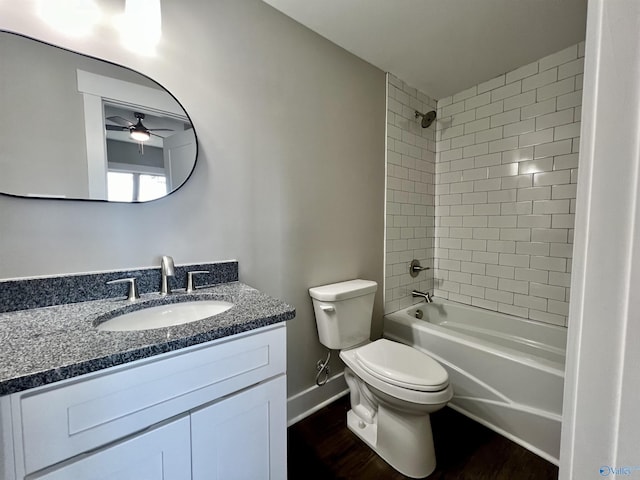 2061 Lindsay Ln S, Athens, AL 35613 - bathroom with wood finished floors, toilet, shower / tub combination, vanity, and a ceiling fan