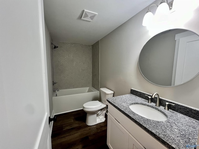 2061 Lindsay Ln S, Athens, AL 35613 - full bathroom with visible vents, toilet, bathing tub / shower combination, wood finished floors, and vanity