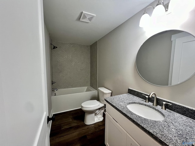 2061 Lindsay Ln S, Athens, AL 35613 - full bath with visible vents, toilet, shower / bathing tub combination, wood finished floors, and vanity