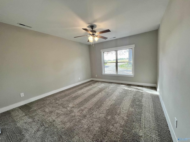 2061 Lindsay Ln S, Athens, AL 35613 - carpeted spare room featuring ceiling fan, visible vents, and baseboards