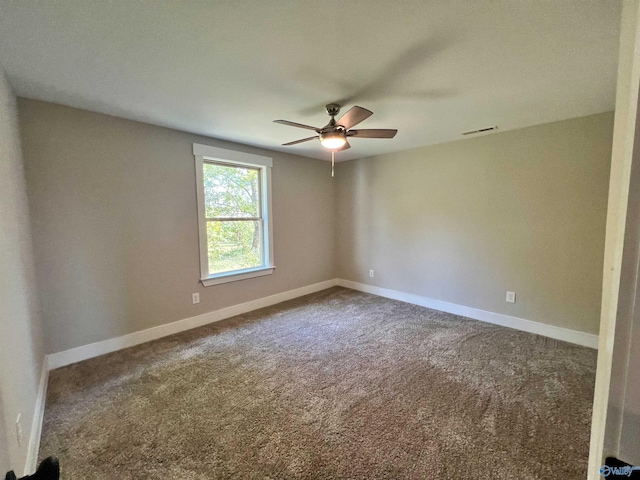 2061 Lindsay Ln S, Athens, AL 35613 - spare room featuring baseboards, visible vents, a ceiling fan, and carpet
