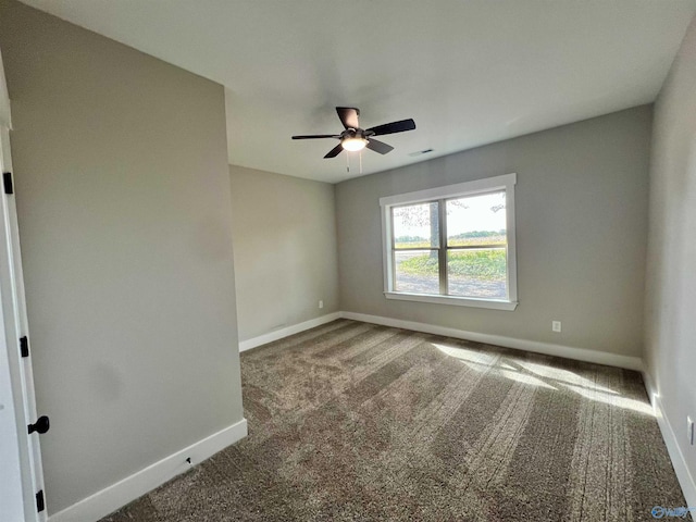2061 Lindsay Ln S, Athens, AL 35613 - carpeted spare room featuring baseboards, visible vents, and a ceiling fan
