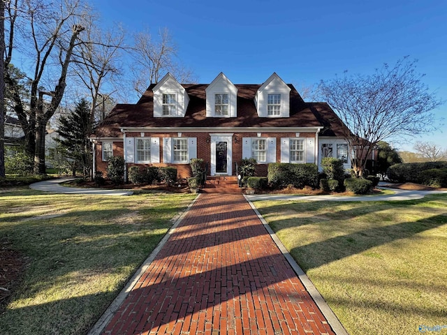 260 Bexar Ave W, Hamilton, AL 35570 - cape cod-style house with brick siding and a front yard