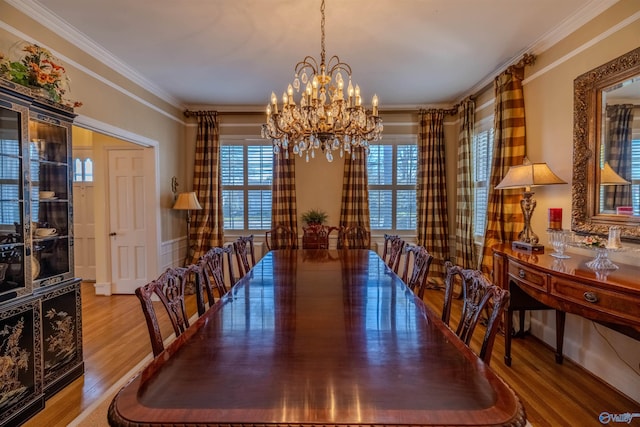 260 Bexar Ave W, Hamilton, AL 35570 - dining area with wood finished floors, a chandelier, and crown molding