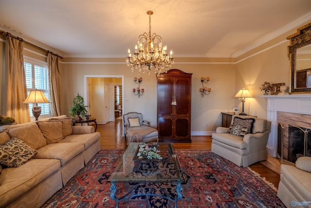 260 Bexar Ave W, Hamilton, AL 35570 - living room with an inviting chandelier, crown molding, baseboards, and wood finished floors
