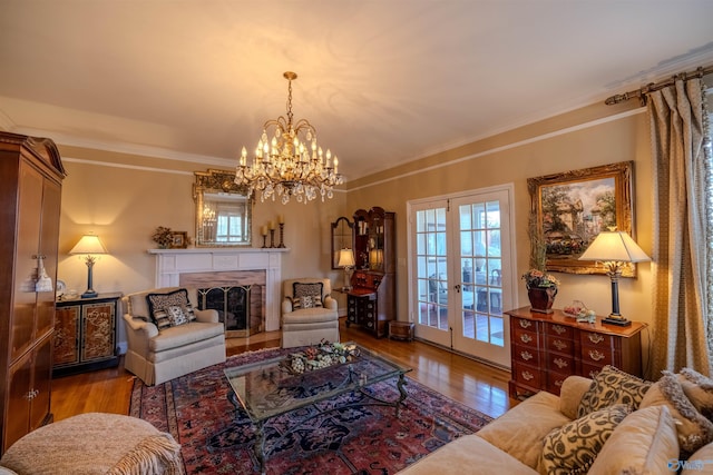 260 Bexar Ave W, Hamilton, AL 35570 - living area featuring a healthy amount of sunlight, french doors, crown molding, and wood-type flooring
