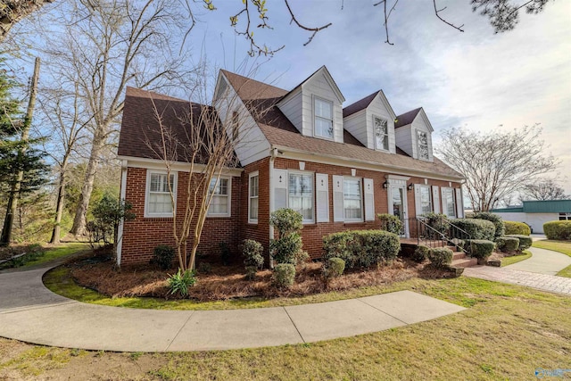 260 Bexar Ave W, Hamilton, AL 35570 - view of side of property featuring brick siding, a shingled roof, and a yard