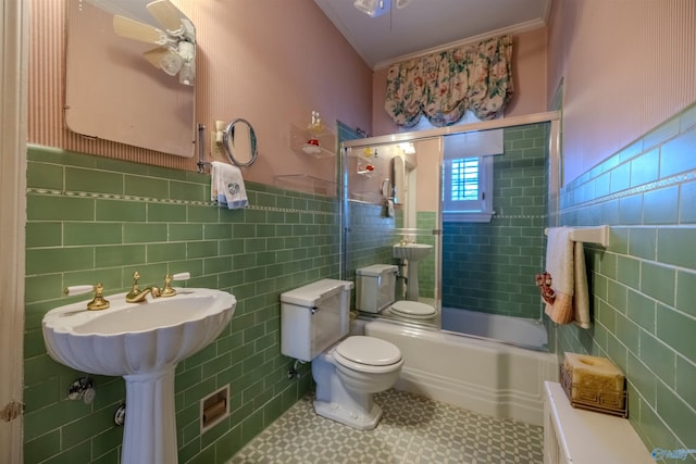 260 Bexar Ave W, Hamilton, AL 35570 - bathroom featuring a ceiling fan, toilet, tile walls, and crown molding