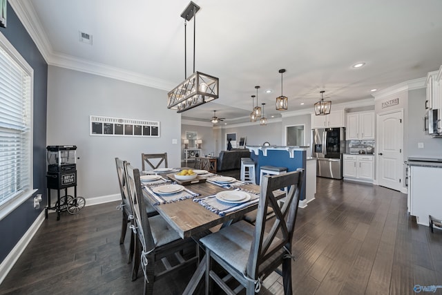 dining area featuring recessed lighting, dark wood finished floors, visible vents, and crown molding
