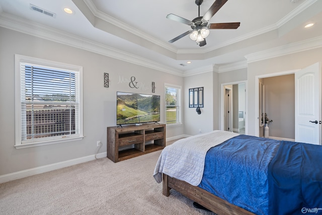 bedroom featuring baseboards, ornamental molding, a tray ceiling, and recessed lighting