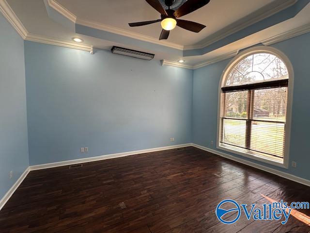 752 12th Way NE, Arab, AL 35016 - unfurnished room with crown molding, hardwood / wood-style floors, ceiling fan, a raised ceiling, and baseboards