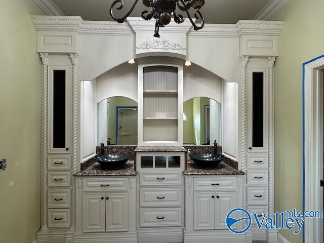 752 12th Way NE, Arab, AL 35016 - bathroom with ornamental molding, a sink, and double vanity