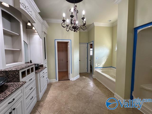 752 12th Way NE, Arab, AL 35016 - full bath featuring a chandelier, two vanities, a bath, and ornamental molding