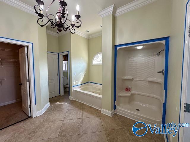 752 12th Way NE, Arab, AL 35016 - bathroom with tile patterned floors, baseboards, a notable chandelier, and ornamental molding