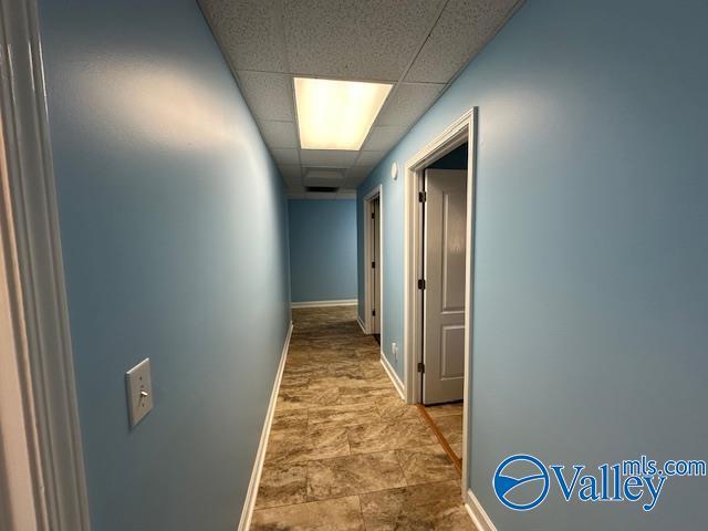 752 12th Way NE, Arab, AL 35016 - corridor with baseboards and a paneled ceiling