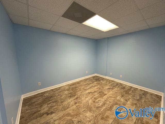 752 12th Way NE, Arab, AL 35016 - unfurnished room with a drop ceiling and baseboards
