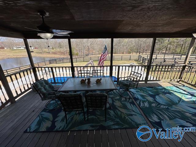 752 12th Way NE, Arab, AL 35016 - deck with ceiling fan, a fenced backyard, and a water view