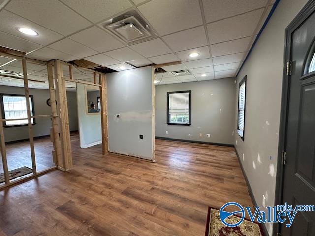 752 12th Way NE, Arab, AL 35016 - spare room featuring a wealth of natural light, wood finished floors, a drop ceiling, and visible vents