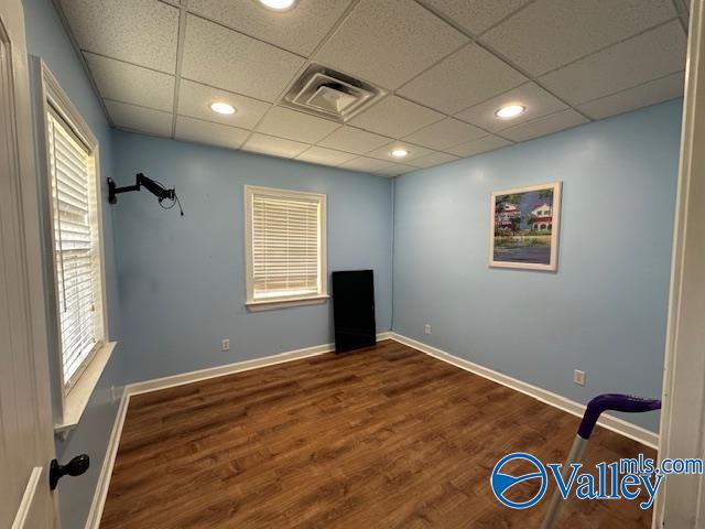 752 12th Way NE, Arab, AL 35016 - empty room featuring baseboards, wood finished floors, a drop ceiling, and visible vents