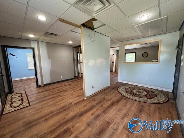 752 12th Way NE, Arab, AL 35016 - empty room with wood finished floors, visible vents, and baseboards