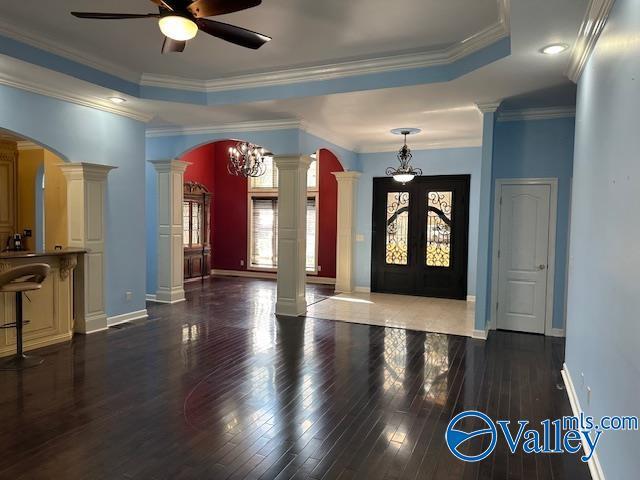 752 12th Way NE, Arab, AL 35016 - entrance foyer featuring decorative columns, arched walkways, and a raised ceiling