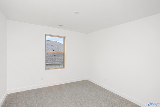 unfurnished room featuring carpet floors