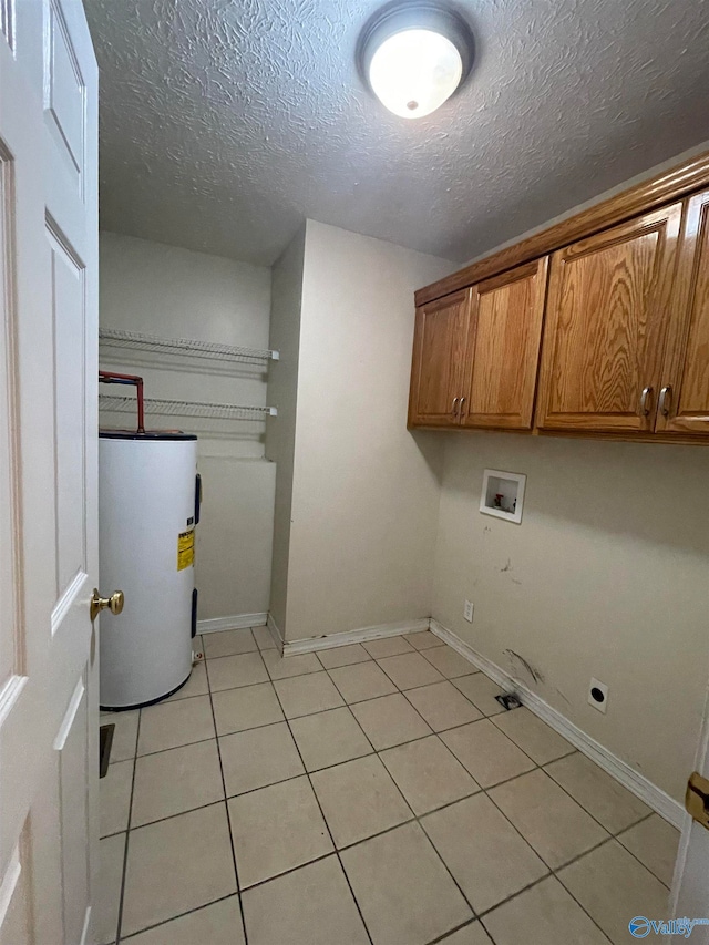 laundry room featuring light tile patterned flooring, hookup for a washing machine, cabinets, electric dryer hookup, and electric water heater