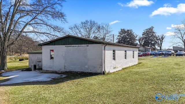 view of home's exterior featuring a yard