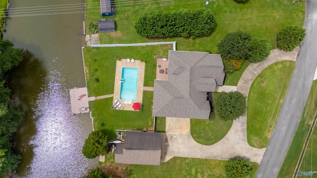 birds eye view of property with a water view