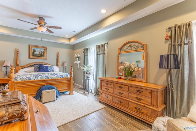 bedroom featuring light wood-type flooring and ceiling fan