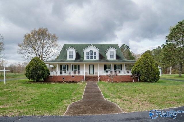 view of front of home featuring covered porch and a front lawn