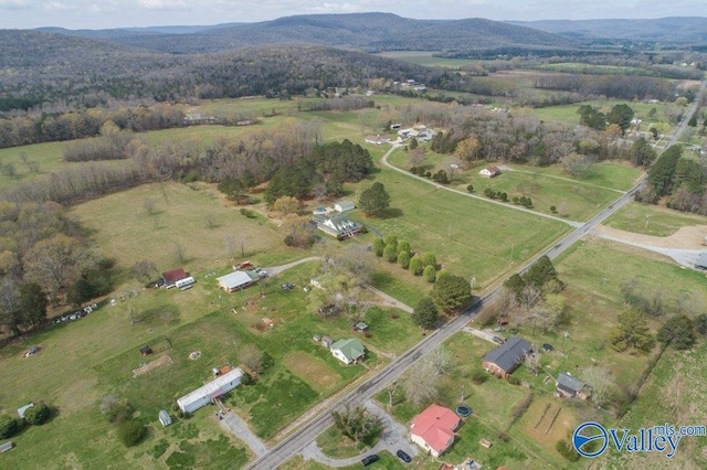 birds eye view of property with a rural view and a mountain view