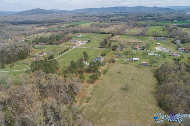 drone / aerial view with a rural view and a mountain view