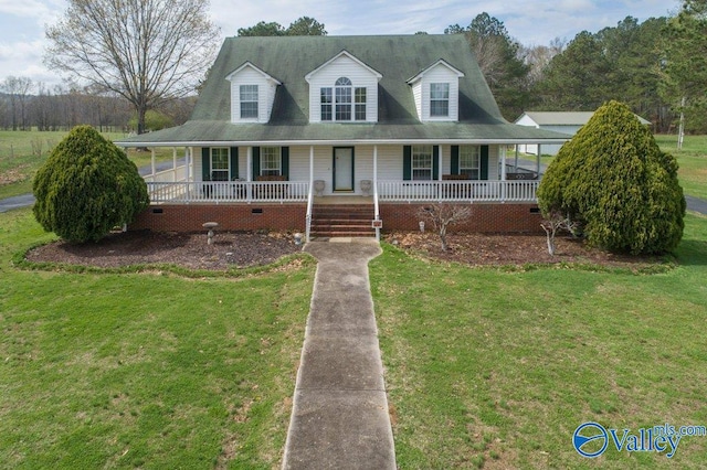 view of front of property featuring covered porch and a front lawn