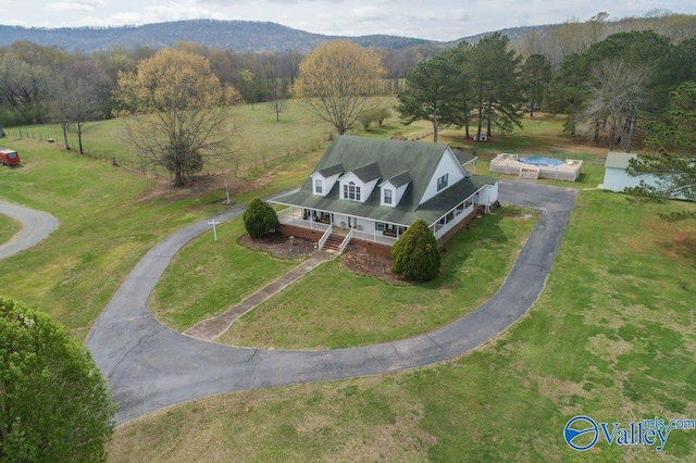 aerial view featuring a mountain view and a rural view