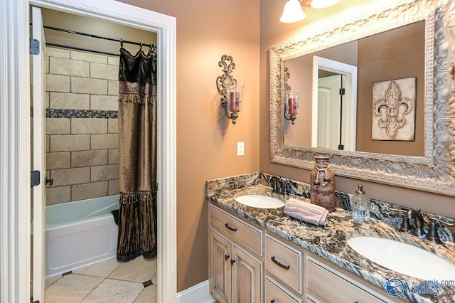 full bathroom with double vanity, shower / bathtub combination with curtain, a sink, and tile patterned floors