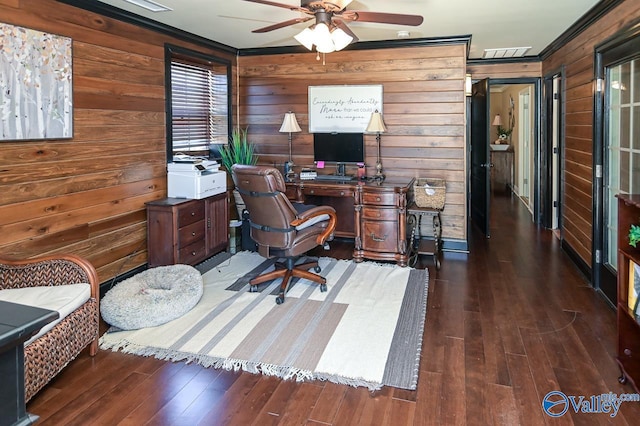 office space with a ceiling fan, visible vents, ornamental molding, and wood finished floors