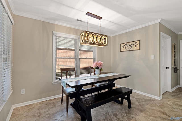 dining area with baseboards, visible vents, and ornamental molding