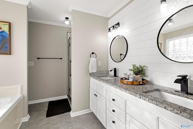 bathroom featuring a sink, a garden tub, ornamental molding, and double vanity