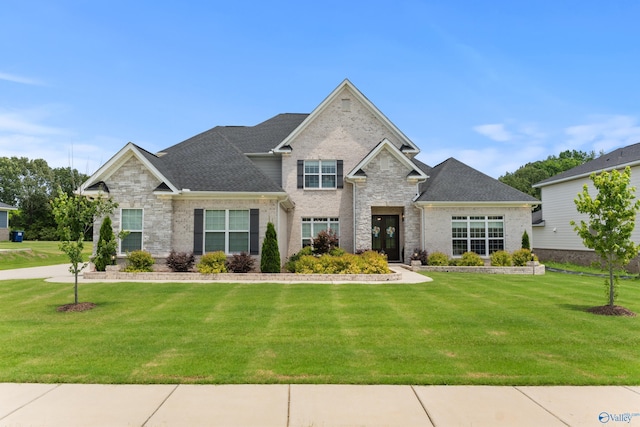 313 Merrydale Dr, Huntsville, AL 35811 - traditional home with a front yard and stone siding